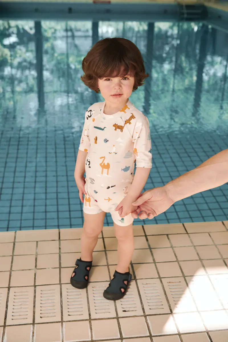 Liewood Baby Schwimm-Jumpsuit Thor „Around the world / Sandy“