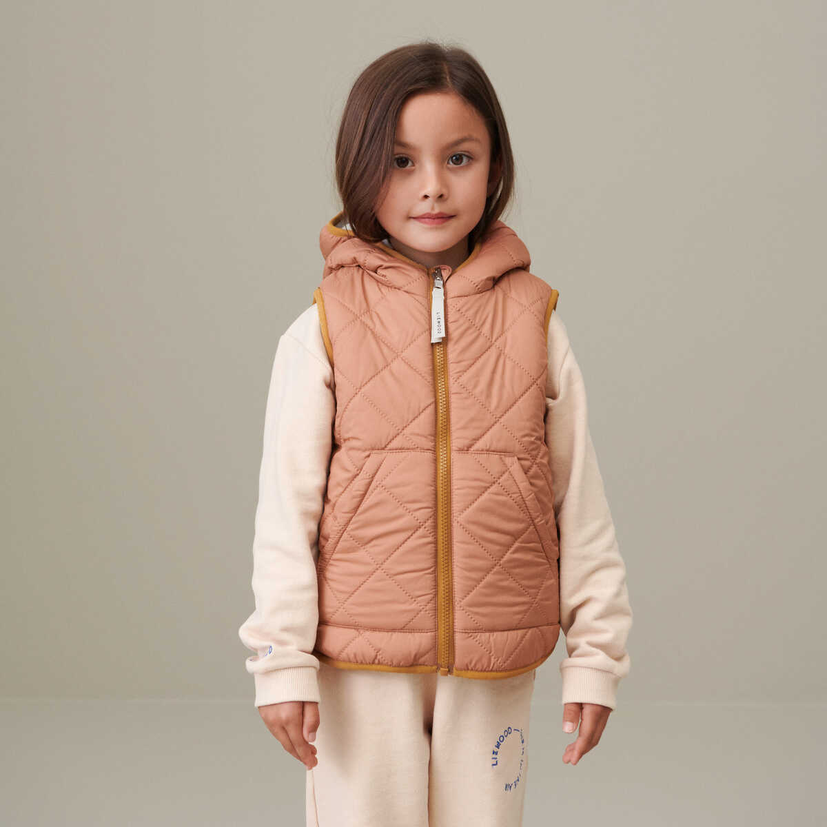 DELISTED Liewood Diana Thermo-Wendeweste für Kinder „Golden caramel / Oat mix“ – Bild 5