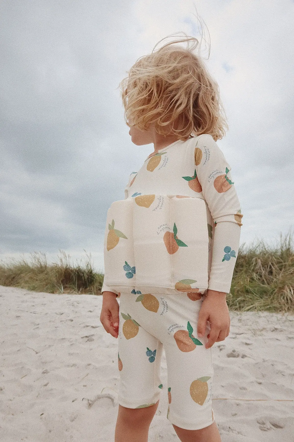 Konges Sløjd Floatsuit Schwimm-Jumpsuit „Fruity“, mit Schwimmhilfe, LSF 50+
