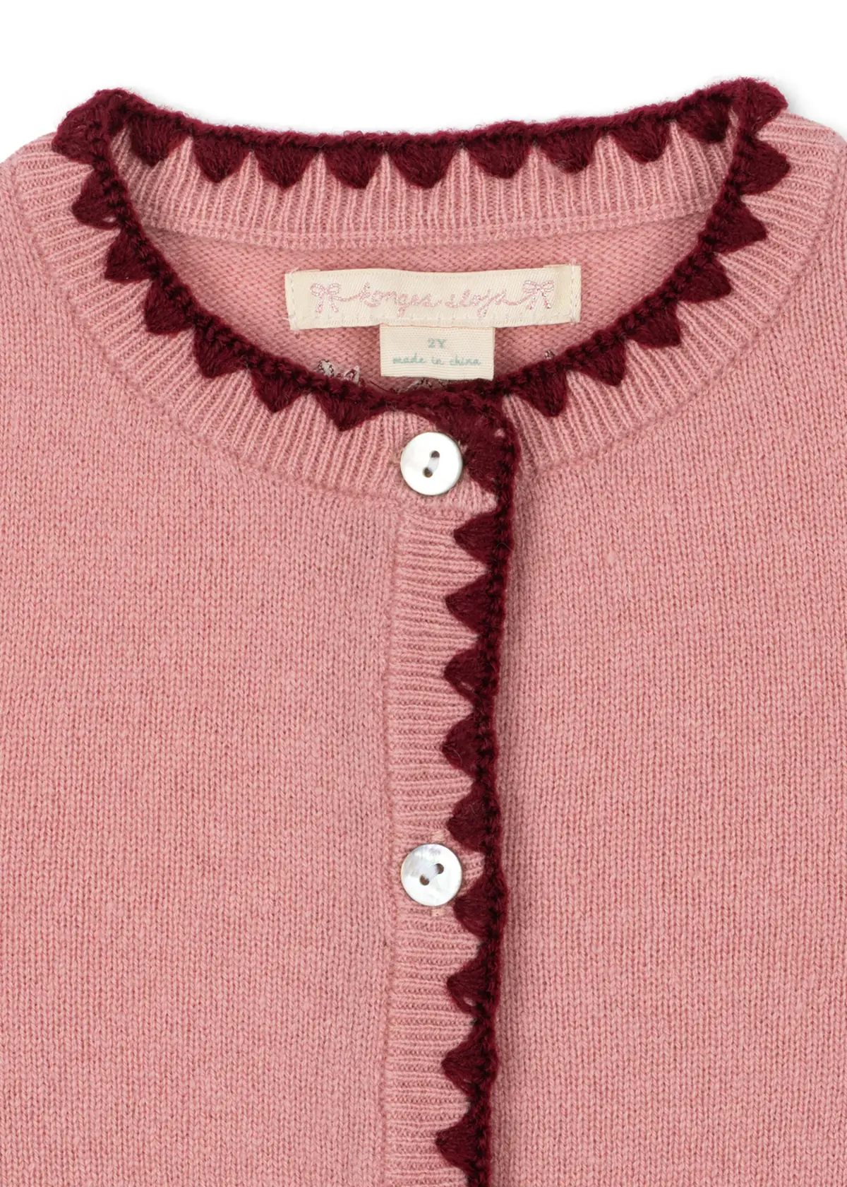 Konges Sløjd Strickjacke Collette „Pale Blush“ – Knopfleiste mit Wellenkante