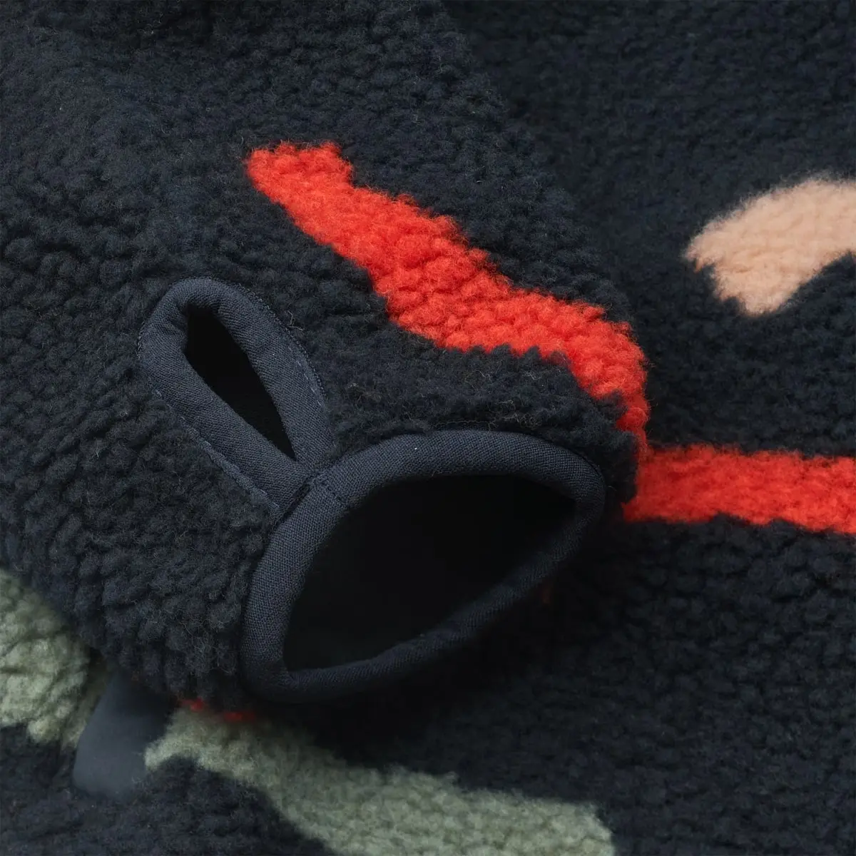 Liewood Nolan Sherpa Jacke für Kinder „Graphic swirls / Classic navy“