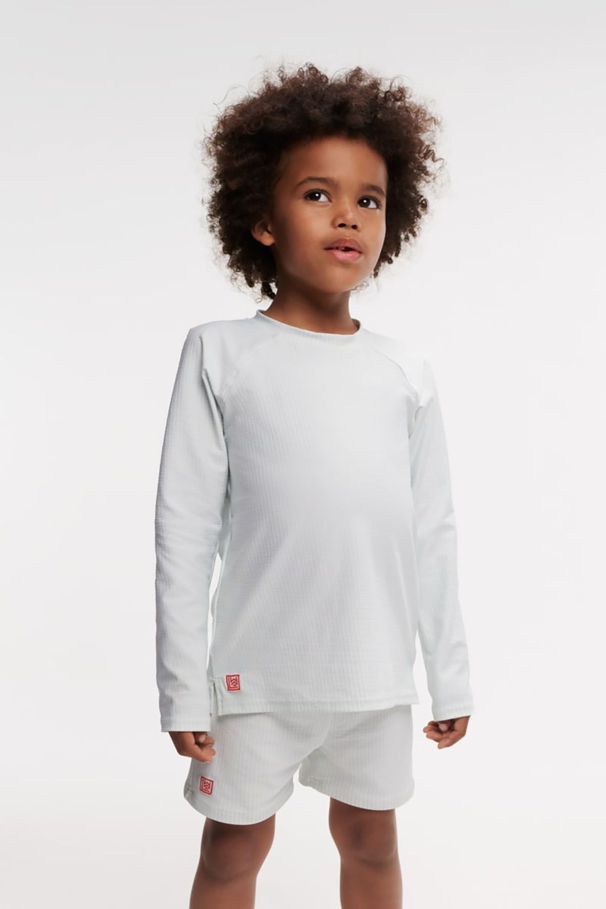 Liewood Otto Kinder-Badehose „Pure sky / Creme de la creme“, Seersucker