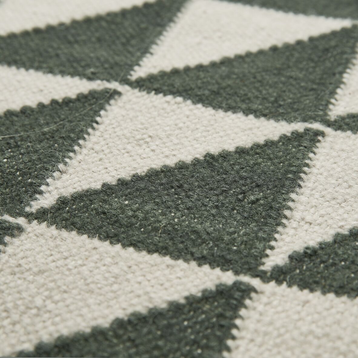 Liewood Teppich Berlin „Triangle hunter green mix“, 90x130cm 02